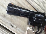 COLT PYTHON 357 MAGNUM
“ELITE” 4” ROYAL BLUE, NEW IN THE BOX WITH OWNERS MANUAL, HANG TAG, COLT LETTER, ETC. - 6 of 10