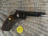 COLT PYTHON 357 MAGNUM 6” BRIGHT NICKEL MFG. 1967, NEW UNFIRED, UNTURNED 100% COND. IN FACTORY COSMOLINE,
IN THE BOX - 2 of 3