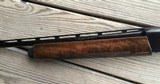 Remington 1100, 410 GA. SPORTING, 28” BARREL, FANTASTIC WOOD, APPEARS UNFIRED, 100% CCND. - 6 of 9