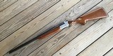 SAVAGE 24C DELUXE 22 LR. OVER 410 GA. POPULAR SIDE BUTTON BARREL SELECTOR, GOLD TRIGGER, WALNUT CHECKERED WOOD, HIGH COND. - 1 of 6