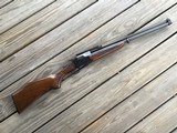 SAVAGE 24 V, DELUXE 222 CAL. OVER 20GA. WALNUT HIGH GLOSS WOOHAS RED FOX ON LEFT SIDE OF RECEIVER & GROUSE IN FLIGHT ON RIGHT SIDE, GUN AS NEW COND. - 1 of 7