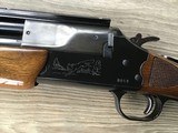 SAVAGE 24 V, DELUXE 222 CAL. OVER 20GA. WALNUT HIGH GLOSS WOOHAS RED FOX ON LEFT SIDE OF RECEIVER & GROUSE IN FLIGHT ON RIGHT SIDE, GUN AS NEW COND. - 5 of 7
