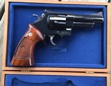 SMITH & WESSON 57-3, 41 MAGNUM, RARE 4” BLUE, TARGET TRIGGER, TARGET HAMMER, TARGET GRIPS, NEW IN WOOD PRESENTATION CASE WITH CLEANING TOOLS - 3 of 4
