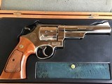 SOLD——-SMITH & WESSON 29-2, 44 MAGNUM 6 1/2” NICKEL, NEW IN THE PRESENTATION BOX WITH OWNERS MANUAL & CLEANING TOOLS - 2 of 4