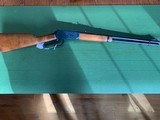 WINCHESTER 94, 44-40 CAL., 20” BARREL, APPEARS UNFIRED, HAS A FEW LIGHT HANDLING MARKS IN THE WOOD - 1 of 5