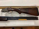 BROWNING CITORI WHITE LIGHTNING, SILVER NITRATE ENGRAVED RECEIVER, 20 GA., 28” BARRELS WITH EXTENDED CHOKE TUBES, NEW UNFIRED IN THE BOX - 2 of 5