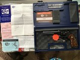 COLT PYTHON 357 MAGNUM, “ELITE” 6” ROYAL BLUE, NEW IN THE BOX WITH OWNERS MANUAL, TEST TARGET, HANG TAG, COLT LETTER, ETC. - 1 of 8