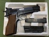 BROWNING BELGIUM, HIGH POWER, 9MM, ADJUSTABLE REAR SIGHT, 2 MAG.S, EXTRA GRIPS, OWNERS MANUAL, NEW IN THE BOX - 2 of 5
