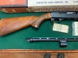 REMINGTON 1100, 410 GA., 25” MOD., VENT RIB, NEW UNFIRED 100% COND. IN THE DUPONT BOX WITH OWNERS MANUAL ETC. - 4 of 5