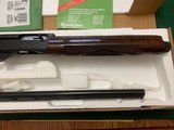 REMINGTON 1100 LT. SPORTING 20 GA., 28” REM CHOKE BARREL, NEW UNFIRED 100% COND. IN THE BOX WITH CHOKE TUBES & WRENCH, OWNERS MANUAL ETC - 4 of 5