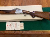 RUGER RED LABEL 12 GA. WITH FANCY WALNUT,
26” CHOKE TUBES, AS NEW COND. WITH 2 CHOKE TUBES & WRENCH, OWNERS MANUAL ETC. IN THE BOX - 4 of 5