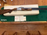 RUGER RED LABEL 12 GA. WITH FANCY WALNUT,
26” CHOKE TUBES, AS NEW COND. WITH 2 CHOKE TUBES & WRENCH, OWNERS MANUAL ETC. IN THE BOX - 1 of 5