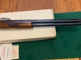 RUGER RED LABEL 12 GA. WITH FANCY WALNUT,
26” CHOKE TUBES, AS NEW COND. WITH 2 CHOKE TUBES & WRENCH, OWNERS MANUAL ETC. IN THE BOX - 3 of 5