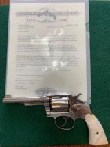 SMITH & WESSON MILITARY & POLICE 1905, 38 SPC. 5” NICKEL, FACTORY PEARL GRIPS, COMES WITH FACTORY AUTHENTICITY LETTER
