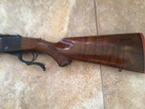 RUGER #1, 45-70 CAL., ALL FACTORY ORIGINAL, 4 DIGIT
SERIAL #, MFG.1969, 22” BARREL, OUT STANDING WALNUT. WITH LOTS OF BURL & FIGURE, 99% COND. - 3 of 6