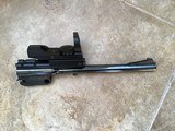 THOMPSON CENTER CONTENDER
GENERATION 1, BLUE, 22 LR., 10” OCTAGON WITH TRUGLO SIGHTS, MINT COND. - 1 of 3