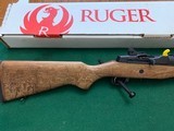 RUGER MINI-14 “ FARMER EDITION” 223 CAL.,18 1/2” BARREL, HAS FARM SCENES LAZER ENGRAVED IN THE STOCK, NEW UNFIRED IN THE BOX, ONLY 750 MFG.