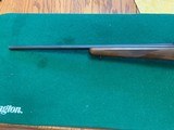 RUGER 77, 17 HMR CAL. 22” BARREL, WALNUT STOCK, BLUE RECEIVER, COMES WITH RINGS, 99+% COND. - 4 of 5