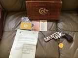 COLT DIAMONDBACK 4” 22 LR., BRIGHT NICKEL, MFG. 1976, NEW UNFIRED, 100% COND. IN THE BOX WITH OWNERS MANUAL, HANG TAG,COLT LETTER, ETC. - 1 of 4