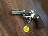COLT PYTHON 357 MAGNUM 4” BRIGHT NICKEL, MFG. 1968, NEW UNFIRED IN THE BOX, WITH OWNERS MANUAL, HANG TAG, COLT LETTER ETC. - 7 of 10
