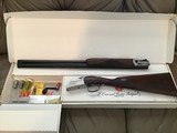 RUGER RED LABEL 50TH ANNIVERSARY 28 GA., 26” BARRELS, VERY FANCY BURL WALNUT WOOD, VERY HIGH COND. IN THE BOX WITH 5 CHOKE TUBES & WRENCH - 1 of 8