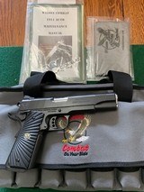SOLD —-WILSON COMBAT TACTICAL SUPERGRADE 45 ACP., NEW IN THE CASE WIITHOWNERS MANUAL & 7 MAGS. - 1 of 5