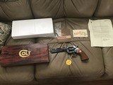 COLT PYTHON 357 MAGNUM, 6” BLUE, MFG. 1980, NEW UNFIRED IN THE BOX WITH OWNERS MANUAL, HANG TAG, COLT LETTER, ETC. - 1 of 6