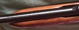 REMINGTON 572 BDL DELUXE, 22 LR., HIGH GLOSS WALNUT WOOD, AS NEW IN THE BOX WITH OWNERS MANUAL - 9 of 11