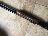 REMINGTON 572 BDL DELUXE, 22 LR., HIGH GLOSS WALNUT WOOD, AS NEW IN THE BOX WITH OWNERS MANUAL - 6 of 11