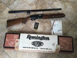 REMINGTON 1100, 16 GA., 28” MOD. CHOKE, VENT RIB, NEW UNFIRED IN THE DUPONT BOX WITH HANG TAG, DUCK PLUG & OWNERS MANUAL
