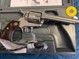 -RUGER VAQUERO 45 COLT, NEW MODEL, BRIGHT STAINLESS, 5 1/2”
BARREL, LIKE NEW IN THE BOX WITH OWNERS MANUAL - 3 of 6