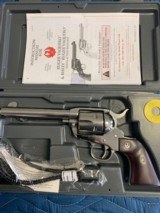 -RUGER VAQUERO 45 COLT, NEW MODEL, BRIGHT STAINLESS, 5 1/2”
BARREL, LIKE NEW IN THE BOX WITH OWNERS MANUAL - 1 of 6