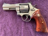 SOLD——-SMITH & WESSON 610-3, 10 MM CAL. 3 7/8” BARREL, 99% COND. IN THE BOX WITH OWNERS MANUAL & EXTRA GRIPS - 4 of 5