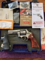 SMITH & WESSON 610-3, 10 MM CAL. 3 7/8” BARREL, 99% COND. IN THE BOX WITH OWNERS MANUAL & EXTRA GRIPS