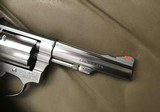 SMITH & WESSON 651, 22 MAGNUM, 4” STAINLESS, “LEW HORTON” WITH BEAUTIFUL WALNUT FINGER GROOVE GRIPS, NEW UNFIRED IN THE BOX - 4 of 7