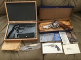 SMITH & WESSON 629 NO DASH, 44 MAGNUM, STAINLESS, I BELIEVE THIS WAS MFG. IN THE FIRST YR. OF THE 629, IT IS UNFIRED IN THE BOX,+ WOODPRESENTATION - 1 of 9