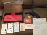 COLT PYTHON 357 MAGNUM, 4” BLUE, MFG. 1966, NEW UNFIRED IN THE BOX WITH OWNERS MANUAL, HANG TAG, COLT LETTER, ETC. - 1 of 6