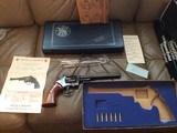 SMITH & WESSON 53-2, JET,22 MAGNUM, 8 3/8”, TARGET GRIPS, NEW UNFIRED IN THE BOX - 1 of 4