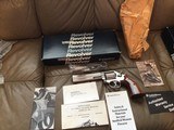 SMITH & WESSON 686 NO DASH, 357 MAGNUM, 6” STAINLESS, TARGET GRIPS, NEW UNFIRED IN THE BOX WITH OWNERS MANUAL, TOLL CLEANING KIT IN PLASTIC - 1 of 6