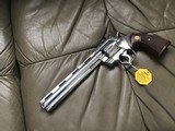 COLT PYTHON 357 MAGNUM, 8” BRIGHT NICKEL, MFG. 1980, NEW UNFIRED IN THE BOX WITH OWNERS MANUAL, HANG TAG, COLT LETTER, ETC. - 2 of 4