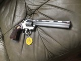 COLT PYTHON 357 MAGNUM, 8” BRIGHT NICKEL, MFG. 1980, NEW UNFIRED IN THE BOX WITH OWNERS MANUAL, HANG TAG, COLT LETTER, ETC. - 3 of 4