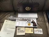 COLT PYTHON 357 MAGNUM, 8” BRIGHT NICKEL, MFG. 1980, NEW UNFIRED IN THE BOX WITH OWNERS MANUAL, HANG TAG, COLT LETTER, ETC. - 1 of 4