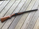 ITHACA 100, 20 GA. 28” MOD & FULL, ENGRAVED RECEIVER, WITH MALLARD DUCK IN FLIGHT, AND ROOSTERPHEASANT IN FLIGHT, 99% COND.