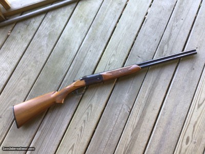 SAVAGE 330 OVER N UNDER, MFG. BY VALMET” 20 GA., 26” IMP. CYL. & MOD. 99% COND.