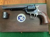 RUGER SINGLE SIX 22 LR., 22 MAGNUM, CONVERTIBLE,“COLORADO CENTENNIAL” NEW IN THE PRESENTATION CASE - 2 of 4