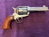 RUGER OLD MODEL VAQUERO 40 S&W CAL 4 5/8” BARREL, GLOSS STAINLESS 99% COND. - 1 of 4