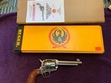 RUGER VAQUERO 44 MAGNUM, OLD MODEL, 5 1/2” STAINLESS GLOSS FINISH, LIKE NEW IN THE BOX WITH OWNERS MANUAL