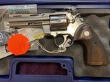 COLT PYTHON,
357 MAGNUM, NEW MODEL, 4 1/4” BARREL, NEW UNFIRED IN THE BOX - 2 of 4
