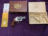 COLT COBRA 38 SPC., 2” BRIGHT NICKEL, SERIAL NO. H78171, LIKE NEW IN THE BOX WITH OWNERS MANUAL, ETC., NO WEAR ANYWHERE ON THIS GUN OR GRIPS. - 1 of 5