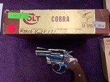 COLT COBRA 38 SPC., 2” BRIGHT NICKEL, SERIAL NO. H78171, LIKE NEW IN THE BOX WITH OWNERS MANUAL, ETC., NO WEAR ANYWHERE ON THIS GUN OR GRIPS. - 5 of 5
